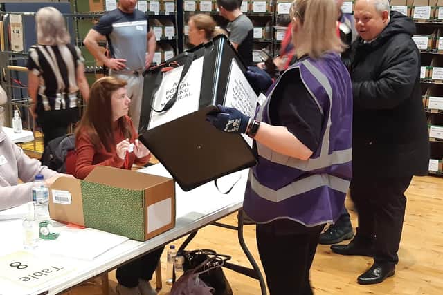 The first ballot box is opened at the Fife count