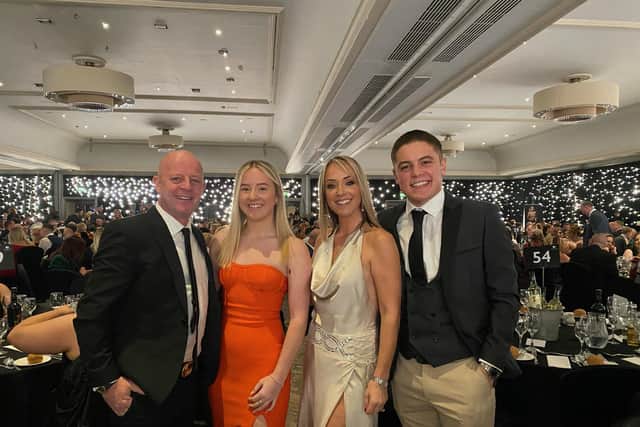 Ervin and Nova Gamble, who run Sands, A Place by the Sea with their children Cole and Elise at the awards ceremony on Sunday.