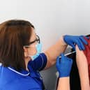 People aged 50 to 64 years are being urged to book an appointment to get their Covid booster and flu jag