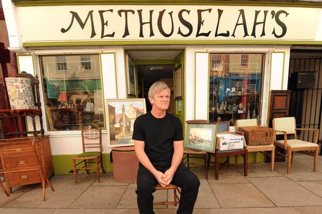 Johnny Sinclair outside his shop Methuselah's in the High Street. Pic: Fife Photo Agency.