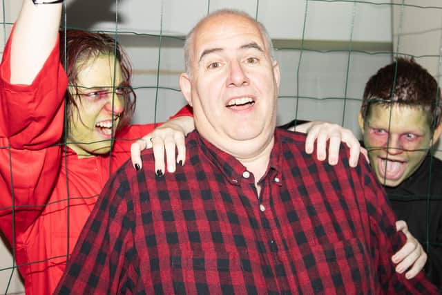 Creator and producer of Edinburgh Zombie Experience Derek Douglas with two of his zombies