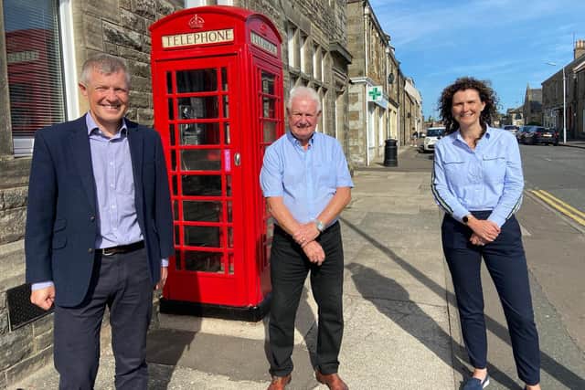 Pictured at Ladybank's re-painted red phone box are Willie Rennie MSP, Kevin McDaid (Ladybank Community Council chairman) and Wendy Chamberlain MP