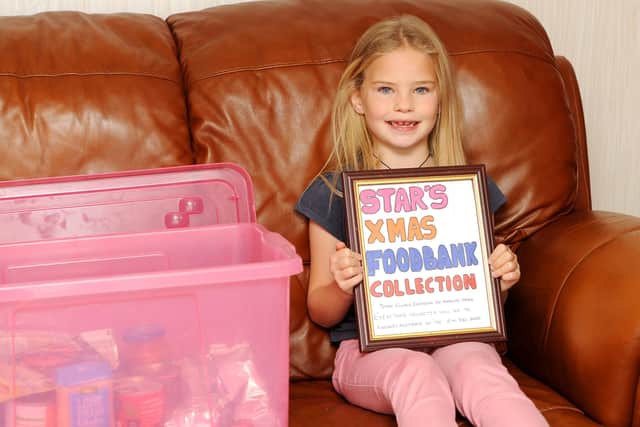 Dysart youngster Star Ross,  7, who has started her own collection for Kirkcaldy Foodbank to help those in need this Christmas. Pic: Fife Photo Agency
