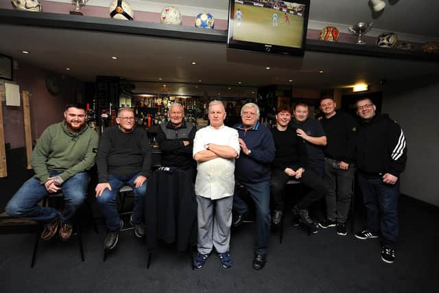 Charley's Bar owner Charles Davidson (centre) with customers in the bar who have generously supported him with his fundraising over the years.  Pic: Fife Photo Agency