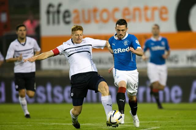 Raith's Jason Thomson in action against Rangers' Nicky Clark during league game in 2014 (Pic Rob Casey/SNS Group)