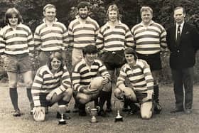 1974 Howe of Fife Sevens winners, back from left, Jack McIntosh, Bob Scott, Dave Strachan, Jim Russell, Bill Graham and Tom Pearson, with, front, Jock Imrie, captain Ian Kirkhope and Chris Reekie with their trophies for Waid Academy and Caithness's sevens as well as their own (Pic: Howe of Fife)
