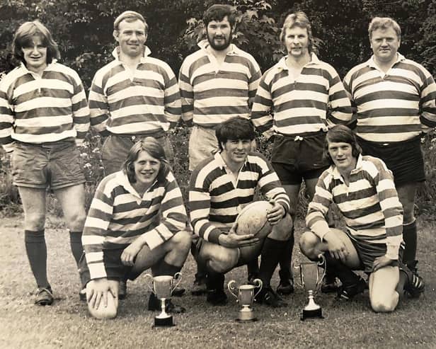 1974 Howe of Fife Sevens winners, back from left, Jack McIntosh, Bob Scott, Dave Strachan, Jim Russell, Bill Graham and Tom Pearson, with, front, Jock Imrie, captain Ian Kirkhope and Chris Reekie with their trophies for Waid Academy and Caithness's sevens as well as their own (Pic: Howe of Fife)