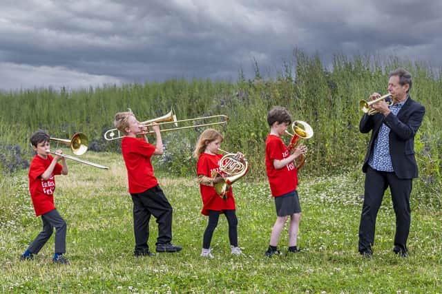 Trumpeter John Wallace practices with children Finlay Gallagher, Alexander Peacock, Maisie Drew and Ewan Gallagher from StAMP (St Andrews Music Participation) who are performing in East Neuk Festival’s 2022 Big Project ‘Thunderplump'. (Photo: Neil Hanna Photography)