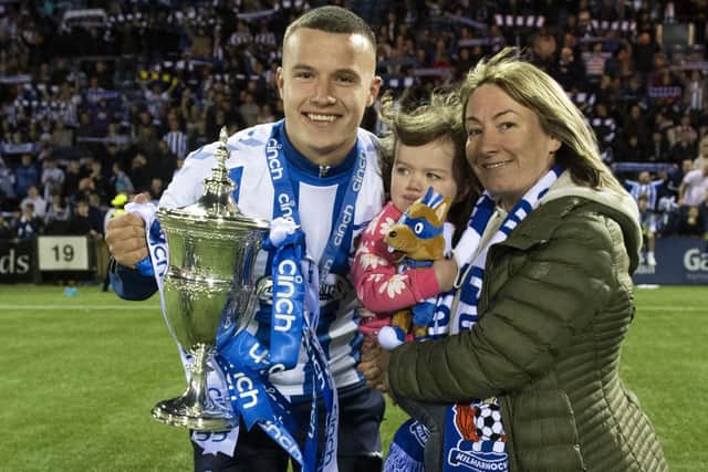 Dylan Tait celebrating with family members after Kilmarnock's 2-1 Scottish Championship win at home to Arbroath in April (Photo by Craig Foy/SNS Group)