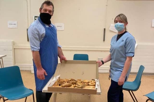 Kevin McArthur from McArthur's Butchers in Dunearn Drive delivering the steak pies to the NHS staff at the vaccination clinic in Templehall.