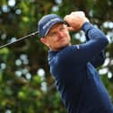 Justin Rose of England tees off the third during a practice round prior to The 150th Open at St Andrews Old Course. Photo by Andrew Redington/Getty Images