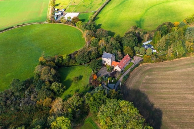 Aerial view of property and surrounding area.