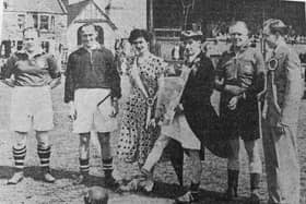 The Ministers v Bankers football match at Stark’s Park was set in motion by local worthy Jimmy Gooseberry, appropriately dressed for the occasion, Also pictured are the Lang Toun Lad and Lass, referee Harry Colville and the team captains.