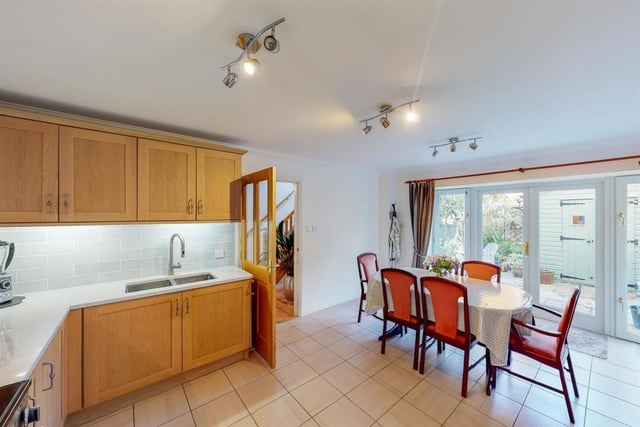 Kitchen with ample space for dining table and chairs.