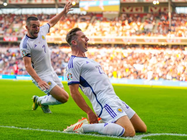 Scotland's Kenny McLean celebrates with John McGinn after scoring winner in Norway (Pic Fredrik Varfjell/Getty Images)