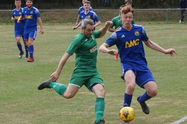 Thornton Hibs' Ian Shanks vying for possession with Craigroyston's Ryan Dixon during their sides' Alex Jack Cup first-round tie on Saturday (Photo: John Laing)