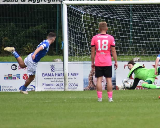 East Fife goalkeeper Allan Fleming making one of two penalty saves from Stranraer forward Ben Armour (Pic: Kenny Mackay)