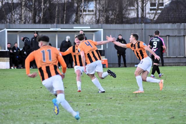 The East Fife team celebrate Kieran Millar's opening goal at Dumbarton last Saturday (Pictures by Kenny Mackay)