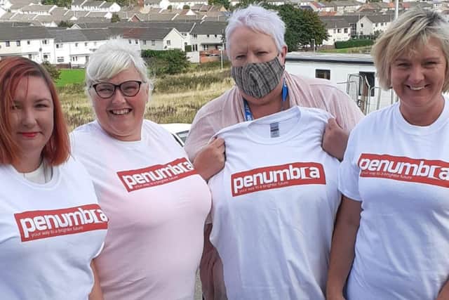 From left: Recovery Practitioner Andrea Gardner; Recovery Worker Bev Smith; Recovery Worker Yvonne Forbes,and  Recovery Worker Ann Parkinson wearing their fashion forward Penumbra tees.