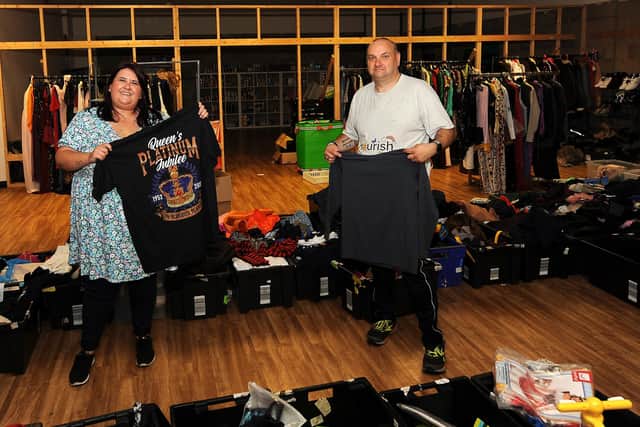 Lynne Scott and volunteer Rab Ramage in Nourish's clothing distribution centre.