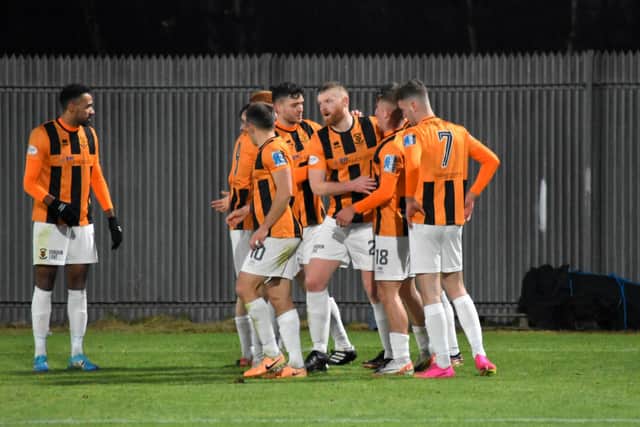 The East Fife team celebrate Brogan Walls’ second-half goal that sealed the three points at Dumbarton last Saturday (Pictures by Kenny Mackay)