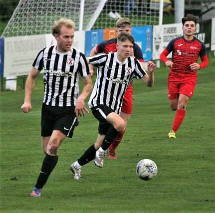 Micheil Russell Smith (left) was St Andrews United's best player against Whitburn