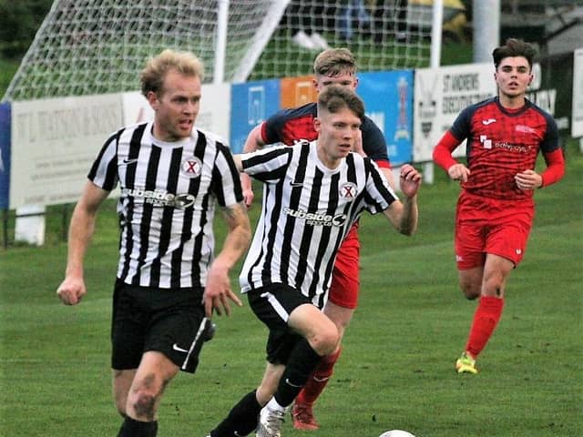Micheil Russell Smith (left) was St Andrews United's best player against Whitburn