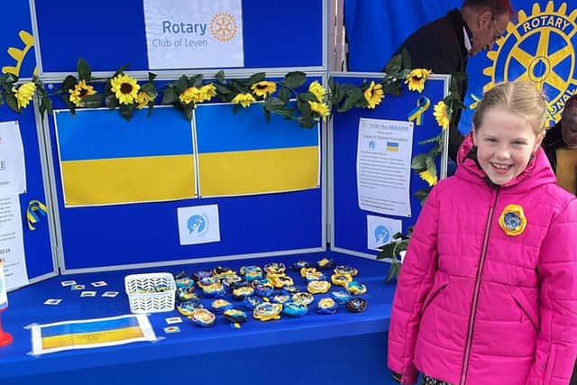 Maisie Law joined forces with the Rotary Club of Leven to sell her pins and brooches at the town's market.