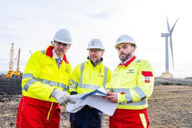 SNG chief executive, Mark Wild, centre, looking at plans with Andrew Colquhoun, left and Stephen Cunniffe from newly appointed contractors Altrad Babcock at the site where work will shortly begin to build the new hydrogen production facility




©Stuart Nicol Photography 2023