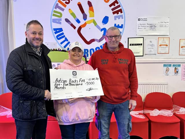 David Archer with, Liza Quin, founder and manager of Autism Rocks Fife, and volunteer Dave Moug (right) (Pic: Submitted)