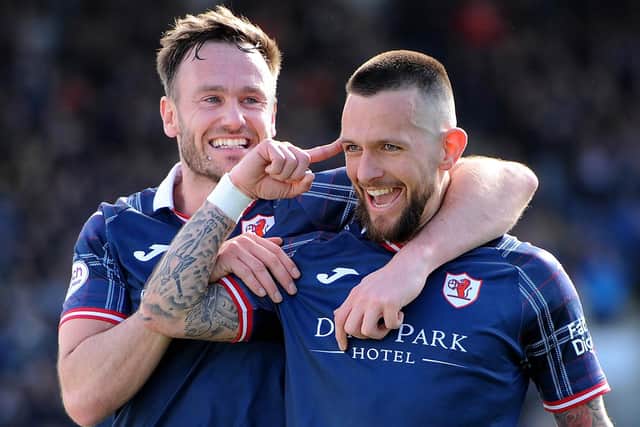 Dylan Easton (right) celebrates Raith goal with team-mate Keith Watson (Pic FPA)
