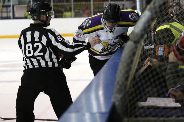 Jay Rosehill punches the boards as he leaves the ice pad  (Pic: Steve Gunn)