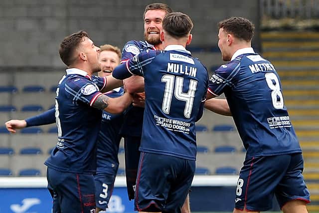 Raith Rovers midfielder Sam Stanton being congratulated by team-mates after opening the scoring against Dunfermline Athletic at Kirkcaldy's Stark's Park on Saturday (Pic: Fife Photo Agency)