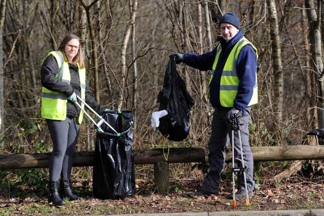 David Spence, with volunteer Sharon Longhurst busy picking up litter in Glenrothes at the weekend. Pic: Fife Photo Agency