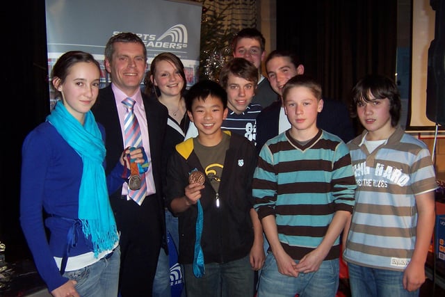 Former Olympic cyclist Bryan Steel presents awards to young sports leaders at Matlock's Highfields School.