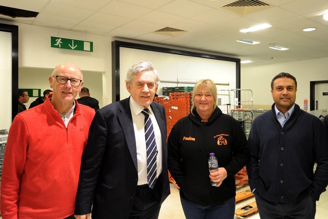 From left, Cllr Alistair Cameron, former Kirkcaldy MP Gordon Brown, Pauline Buchan & Tahir Ali (owner of the former Fife Department Store which was used to store donations this year).