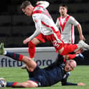 Zak Rudden tackles Liam McStravick during Raith's 1-0 defeat to Airdrieonians in the SPFL Trust semi-finals (Pic by Fife Photo Agency)