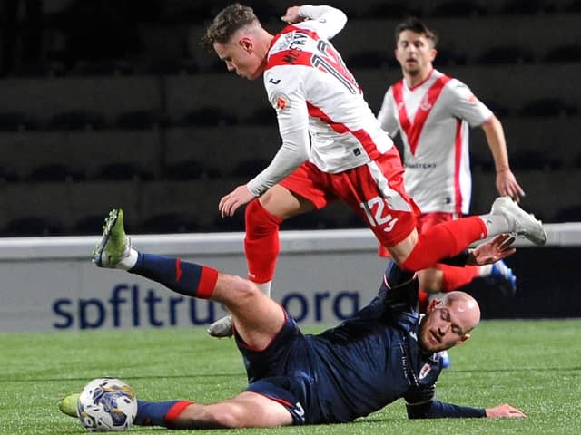 Zak Rudden tackles Liam McStravick during Raith's 1-0 defeat to Airdrieonians in the SPFL Trust semi-finals (Pic by Fife Photo Agency)