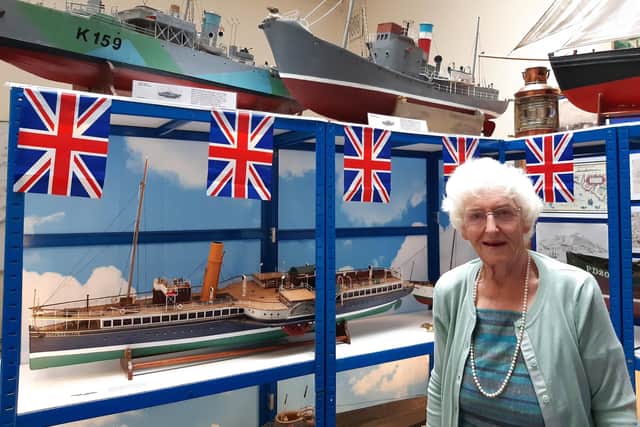 Mrs Margaret Deans with some of the models built by her late husband Brian.
