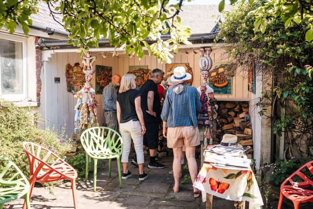 Visitors to one of the local studios.