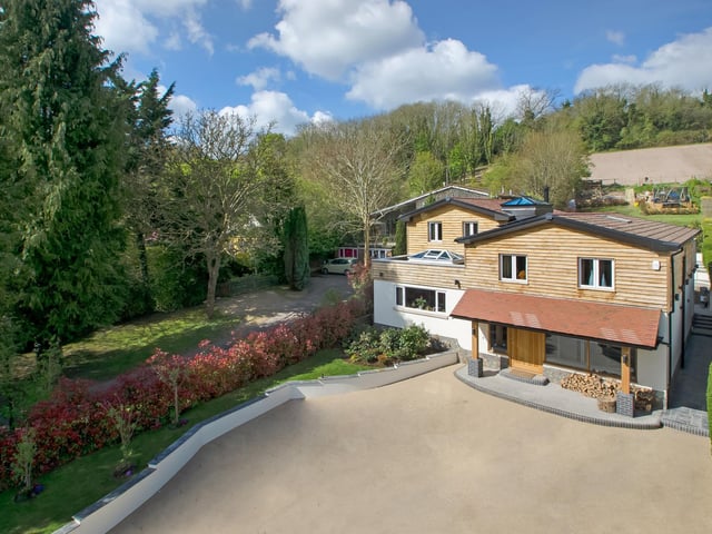 This four bedroom house in Horndean is on the market for just over £1m. It is listed by Fine and Country.