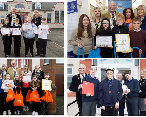 Pupils from the four schools honoured for their travel plan work with Provost Jim Leishman (Pic: Submitted)