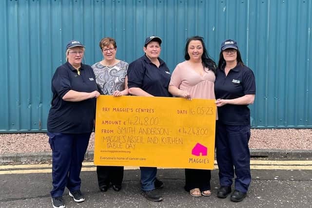 Tracey Melville, Lorraine Houghton, Linda Johnstone, Zoey McBride and Diane McDonagh handed over their donation to Maggie's Fife