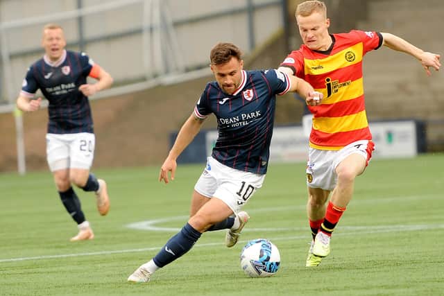 Raith Rovers' Lewis Vaughan going up against Partick Thistle's Scott Tiffoney at Kirkcaldy's Stark's Park on Friday (Pic: Fife Photo Agency)
