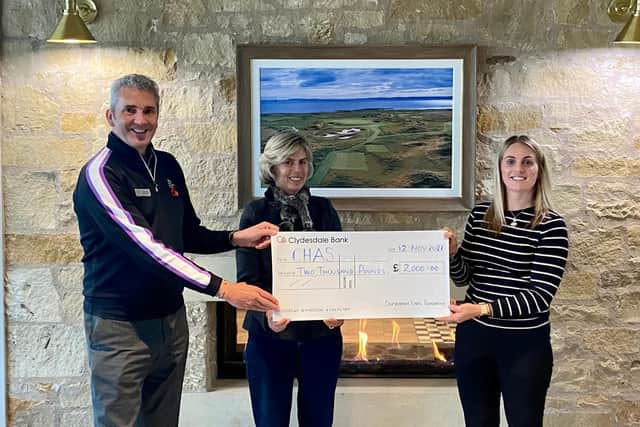 David Scott, Lady Minnie Balniel of Balcarres Estate and Jenna Cameron, a nurse at CHAS, Kinross accepting the cheque.