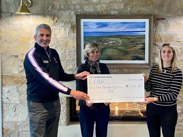 David Scott, Lady Minnie Balniel of Balcarres Estate and Jenna Cameron, a nurse at CHAS, Kinross accepting the cheque.