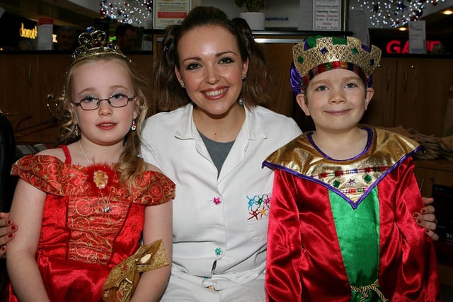 'Nina' from Cbeebies Nina & The Neurons was a huge hit with young fans when when she turned on the lights in 2008.
She is pictured with Princess (Caitlin Doyle, aged seven) and Prince (Andrew Strachan, 8), both from Glenrothes.