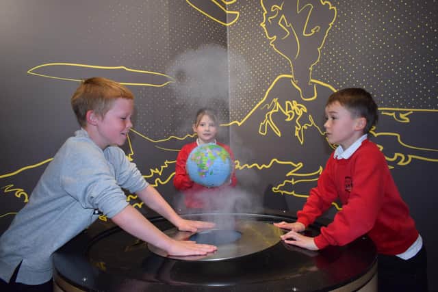 From left to right, Kyle, Hannah, and Harris, alongside their classmates became 'Climate Engineers for the day at Dundee Science Centre.