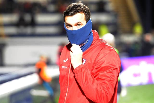 Ian Murray wrapped up against the cold on Friday night