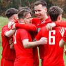 Stuart Cargill is congratulated by his Glenrothes team-mates after netting penalty against Broxburn Athletic (Pics by Ross McQuade)